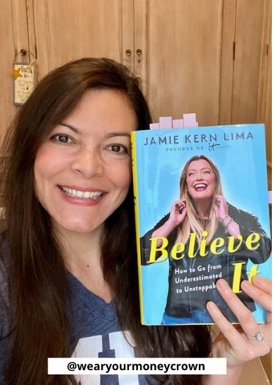 A picture of me holding Jamie Kern Lima's book Believe It!