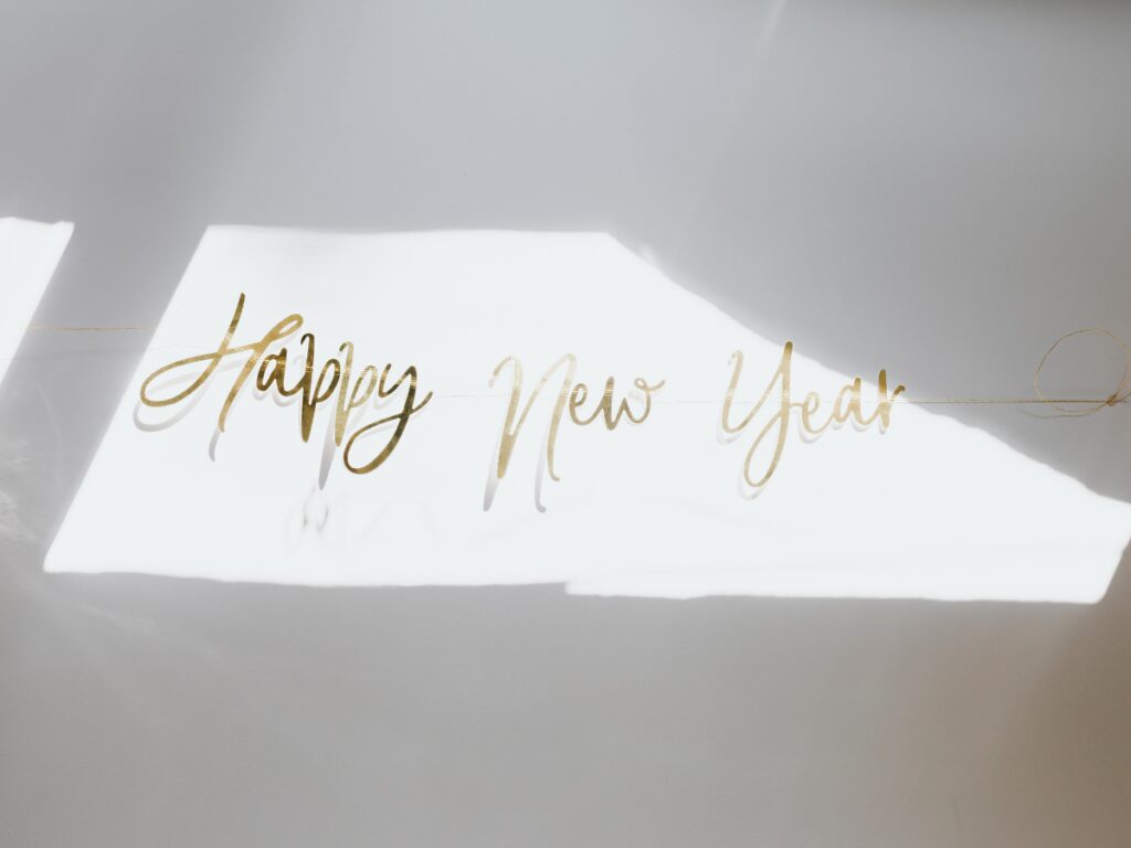 A reflection of light on the words Happy New Year